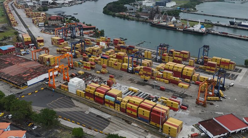 An aerial view of argo containers stacked at the Cristobal port, operated by the Panama Ports Company, in Colon, Panama, Friday, Feb. 6, 2026. (AP Photo/Matias Delacroix)