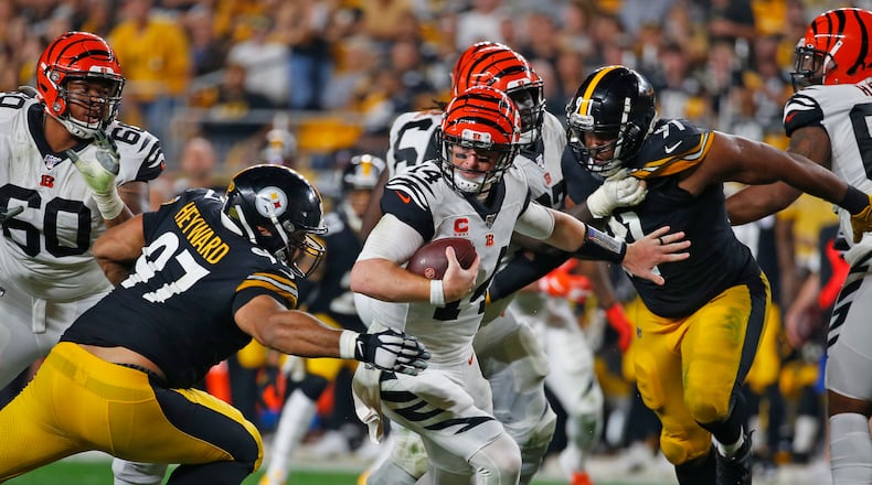 PITTSBURGH, PA - SEPTEMBER 30: Cameron Heyward #97 of the Pittsburgh Steelers sacks Andy Dalton #14 of the Cincinnati Bengals in the third quarter on September 30, 2019 at Heinz Field in Pittsburgh, Pennsylvania. (Photo by Justin K. Aller/Getty Images)