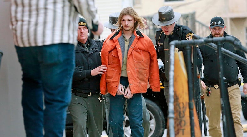 Edward "Jake" Wagner planned to plead guilty to eight counts of aggravated murder. In exchange, prosecutors have dropped the possibility of a death sentence on Thursday, April 22, 2021. Wagner is shown escorted by police into the holding area in the Pike County Common Pleas Court in Waverly, Ohio, in this Nov. 27, 2018, file photo. (Brooke Laay, Valley/The Columbus Dispatch via AP, File)