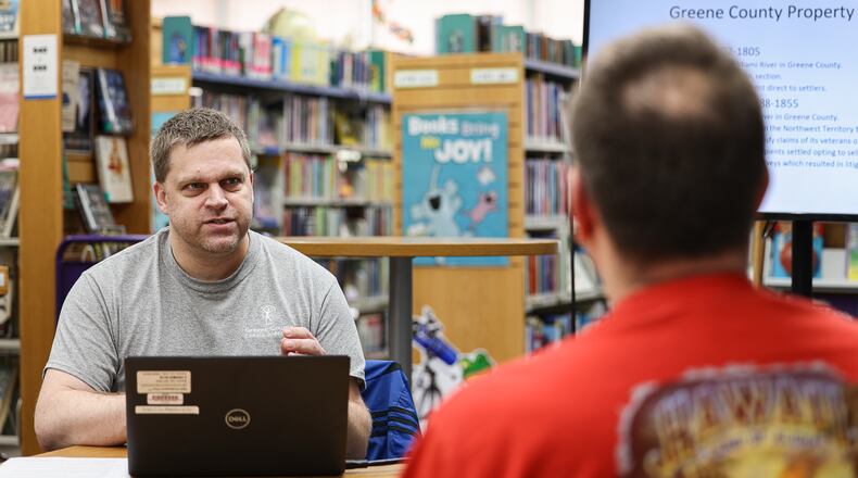 David Distelhorst talks during a program on Thursday, April 3, at Winters-Bellbrook Community Library. Distelhorst presented a program on researching a house's history. BRYANT BILLING / STAFF