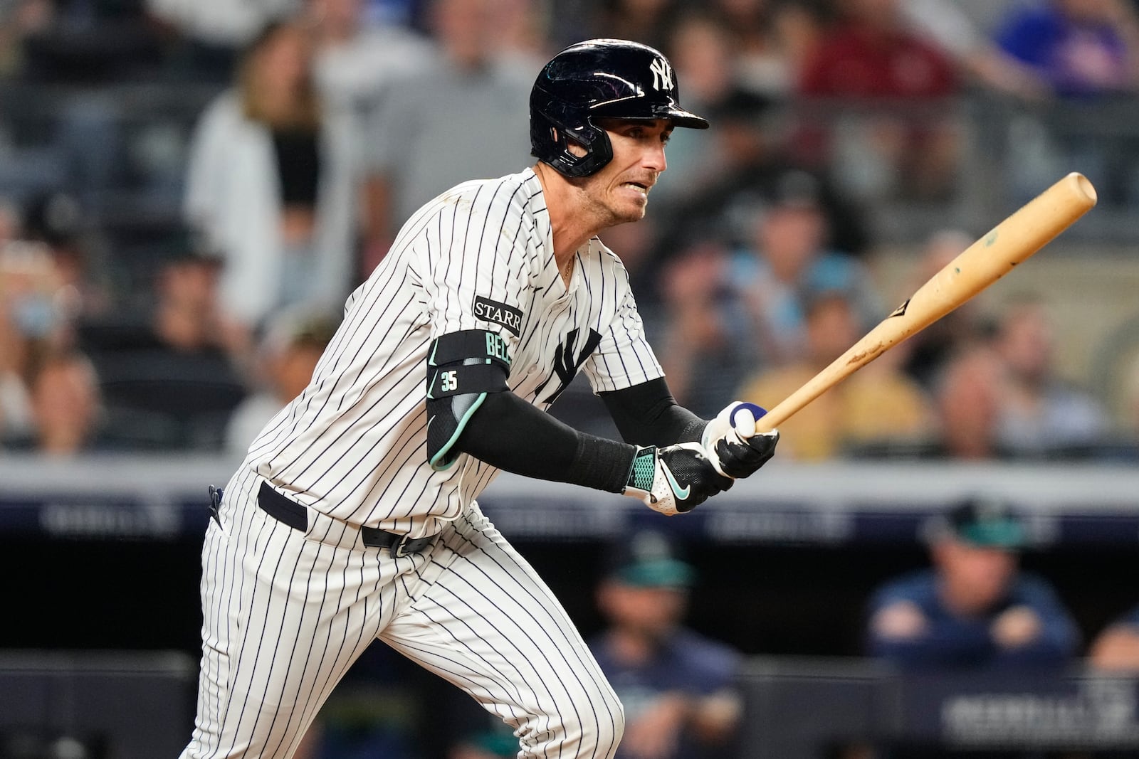 New York Yankees' Cody Bellinger hits a single during the ninth inning of a baseball game against the Seattle Mariners, Thursday, July 10, 2025, in New York. (AP Photo/Yuki Iwamura)