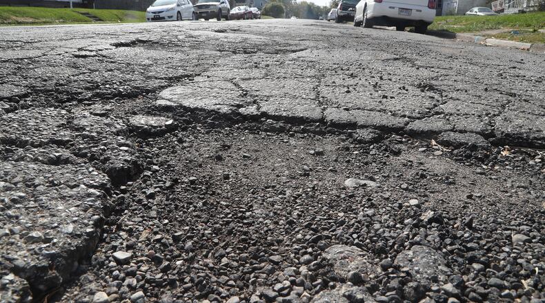 Olive Street in Springfield is one of the neighborhood streets that will be resurfaced later this year. BILL LACKEY/STAFF