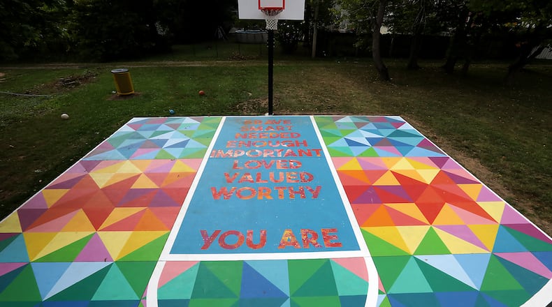 The mural painted on a basketball court in a small park along Woodward Avenue in Springfield in 2020 was made possible through a partnership between Project Jericho and The Conscious Connect, Inc. Project Jericho's next mural will be along the Springfield bike path. BILL LACKEY/STAFF