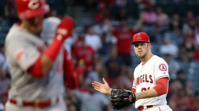 ANAHEIM, CALIFORNIA - JUNE 26: Ty Buttrey #31 of the Los Angeles Angels of Anaheim looks on after forcing Jose Iglesias #4 of the Cincinnati Reds to ground out ending the game during the ninth inning of a game at Angel Stadium of Anaheim on June 26, 2019 in Anaheim, California. The Los Angeles Angels of Anaheim defeated the Cincinnati Reds 5-1. (Photo by Sean M. Haffey/Getty Images)