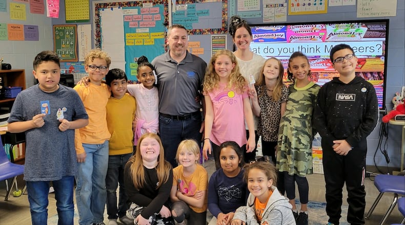 Ridgewood School students in the class of Kelly Biers met with Grandpa Joe's Candy Shop founder and owner Christopher Beers to discuss ways to keep  impressionable kids from purchasing candy cigarettes during as part of a project. Catholic Central students also worked on the project and met with Beers.