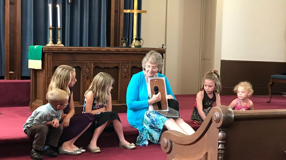 A woman leads a children's service at New Carlisle’s Honey Creek Presbyterian Church, 212 Jefferson St., which will have its final service and a special celebration of its 221 years of service beginning at 3:30 p.m. Sunday, Nov. 30. CONTRIBUTED
