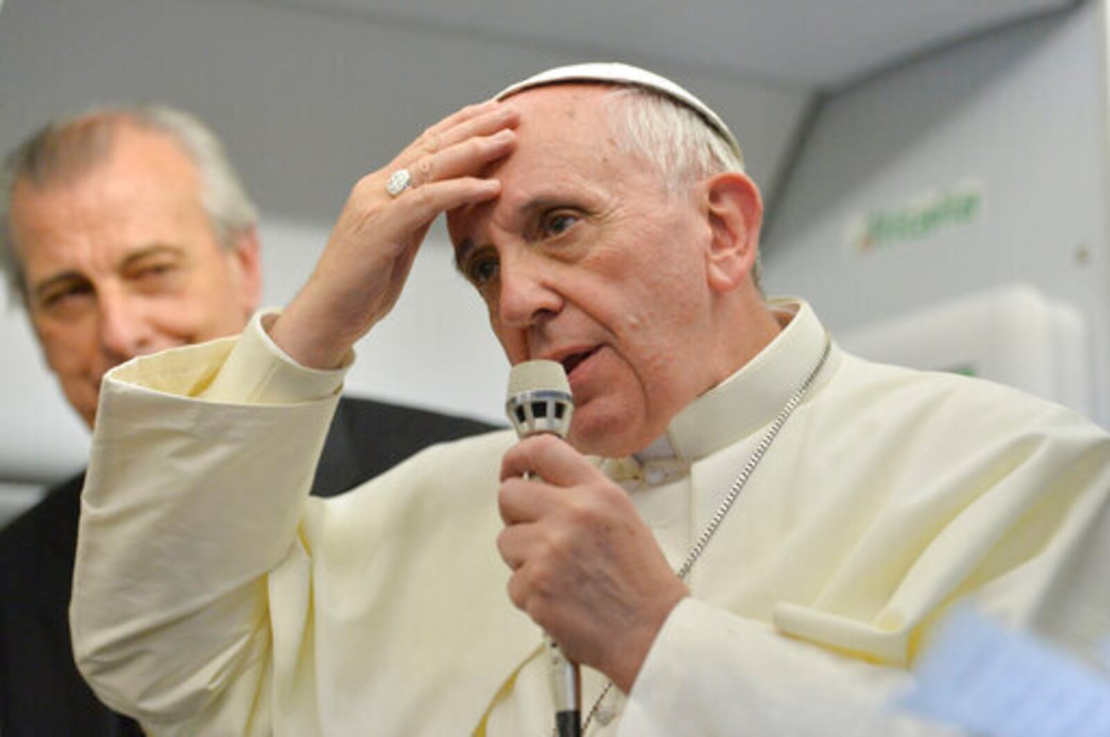 FILE - Pope Francis speaks during a news conference aboard the papal flight on its way back from Brazil, where he famously uttered "Who am I to judge?" when asked about a Vatican monsignor who purportedly had a gay lover in his past, Monday, July 29, 2013. (AP Photo/Luca Zennaro, Pool, file)