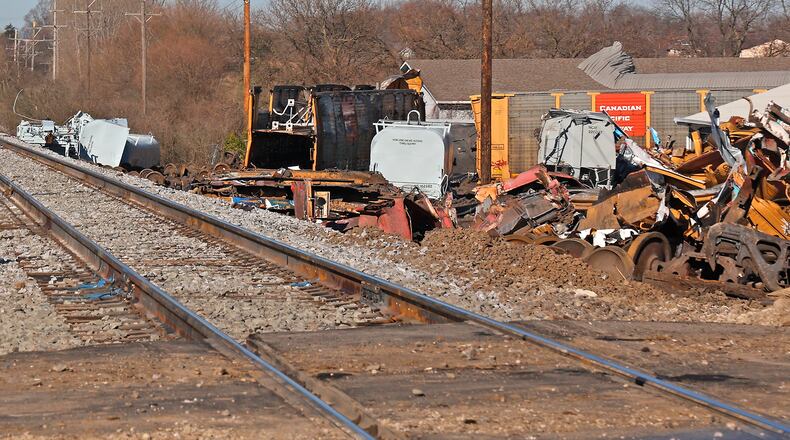 Work continues at the Norfolk Southern derailment site in Clark County as workers cut the remaining train cars into pieces to be hauled away Wednesday, March 15, 2023. BILL LACKEY/STAFF