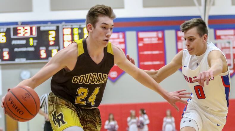 Kenton Ridge High School’s Tyler Eberhart drives to the hoop. CONTRIBUTED PHOTO BY MICHAEL COOPER