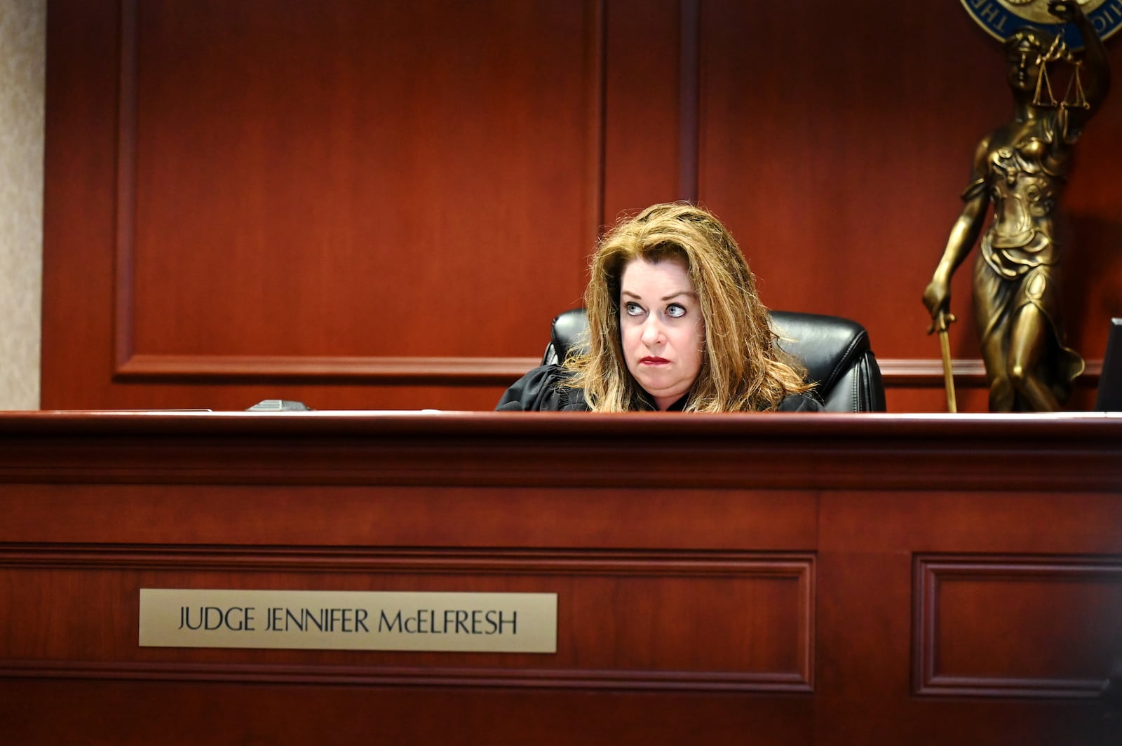 Dominick Grubb, 18, of Hamilton, pleaded guilty on July 3, 2025, to aggravated burglary and conspiracy to commit murder, both of which are first-degree felonies. He faces up to 16-1/2 years for each charge. Pictured Butler Common Pleas Court Judge Jennifer McElfresh on April 3, 2025, when Grubb told her he no longer wants her services and plans to retain a new attorney. He never retained a new attorney. MICHAEL D. PITMAN/FILE
