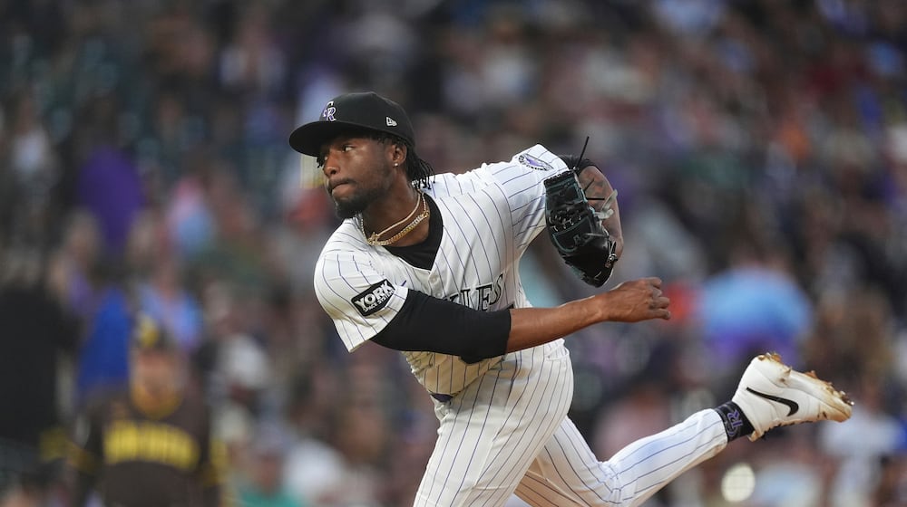 FILE - Colorado Rockies relief pitcher Angel Chivilli (57) in the fourth inning of a baseball game, Sept. 6, 2025, in Denver. (AP Photo/David Zalubowski, File)