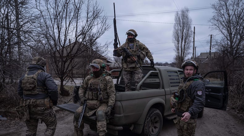 In this photo provided by Ukraine's 93rd Kholodnyi Yar Separate Mechanized Brigade press service, soldiers are at a pickup before assignments on the frontline near Kostyantynivka, Donetsk region, Ukraine, Tuesday, Feb. 17, 2026. (Iryna Rybakova/Ukraine's 93rd Mechanized Brigade via AP)