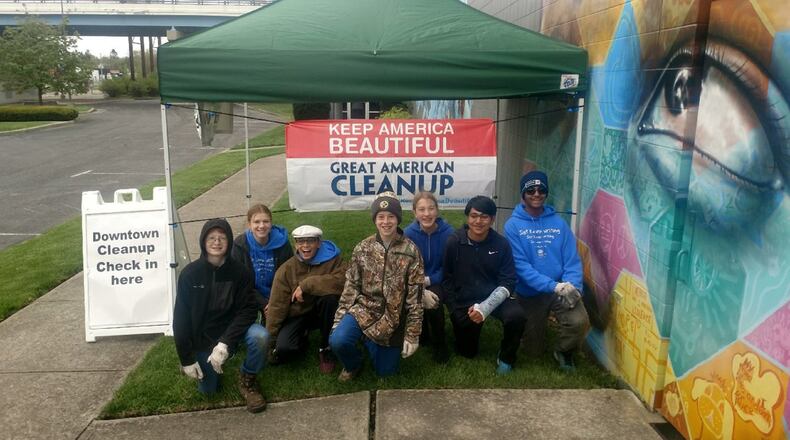 Friday, May 3 marks Service Day in Clark County. Over 1,000 volunteers will participate in up to 50 community improvement projects across the county. Pictured is last year’s Annual Downtown Cleanup, which is held in conjunction with Service Day. The event drew 119 volunteers, who picked up 105 bags of litter, pulled weeds, cut honeysuckle, laid mulch, swept sidewalks and spruced up about 30 blocks of downtown Springfield. CONTRIBUTED