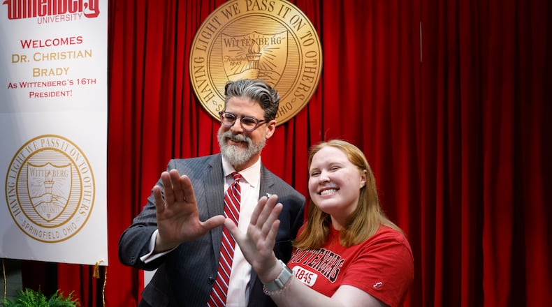 Dr. Christian M. M. Brady, left, takes a photo with junior Katie Lowry, student senate president, during an event where he was announced as the new president on Friday, May 9, 2025, at Wittenberg University. JOSEPH COOKE/STAFF