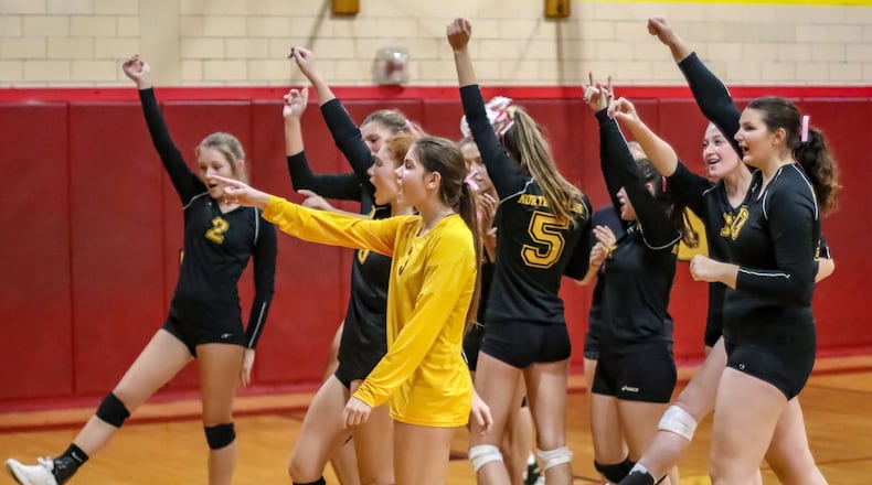 The Northeastern High School volleyball team celebrates after beating Triad in three sets on Tuesday night. The Jets are 17-1 and ranked 20th in Division III. CONTRIBUTED PHOTO BY MICHAEL COOPER