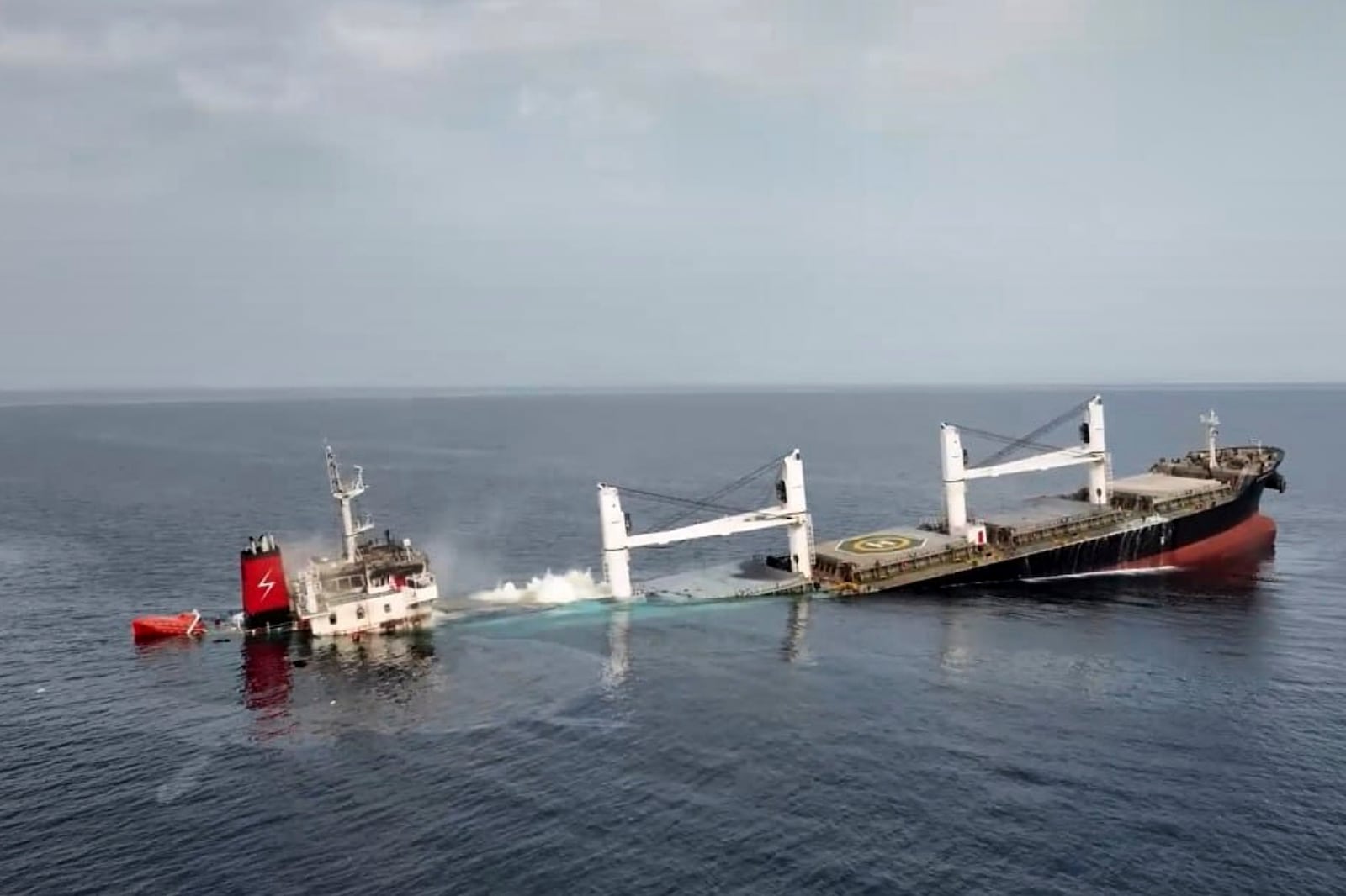 This image released by Ansar Allah Media Office in Yemen shows the Liberian-flagged bulk carrier Eternity C is seen as it sinks in the Red Sea, Wednesday, July 9, 2025.( Ansar Allah Media Office via AP)