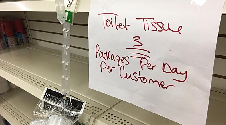 Panic buying as the coronavirus grew left many shelves empty with some products being rationed. STAFF PHOTO