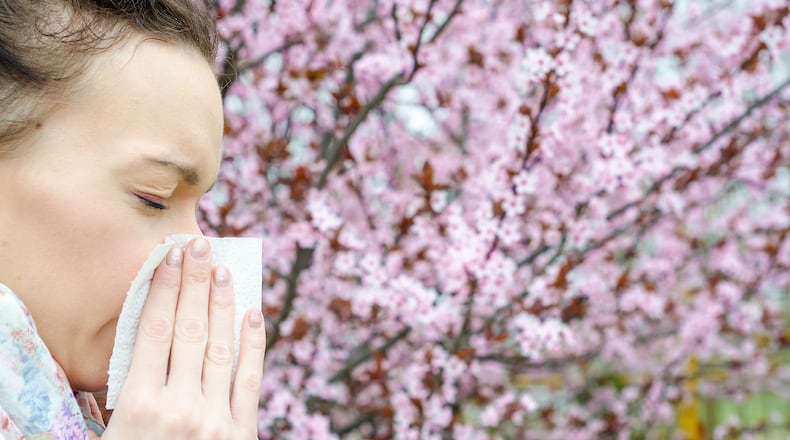 Seasonal allergy symptoms can include coughing, sneezing, wheezing, itchy eyes, a scratchy throat and other conditions. CONTRIBUTED