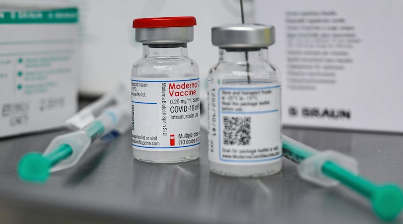 Small bottles containing Moderna's active ingredient for a Corona vaccination are pictured at the vaccination centre in Eberswalde, Germany, Wednesday, Jan. 27, 2021. (Patrick Pleul/dpa via AP)