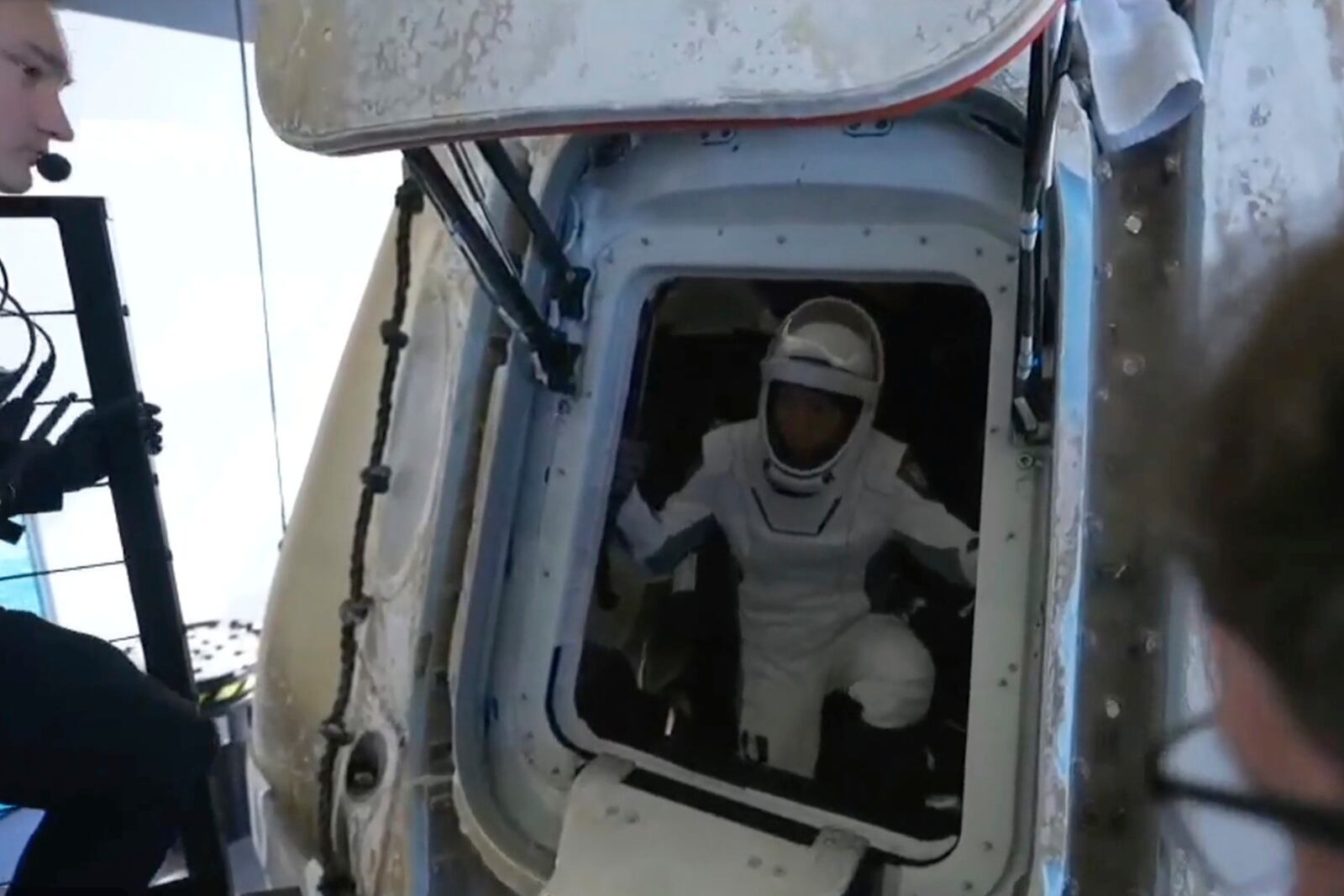 In this image from video provided by SpaceX, Jannicke Mikkelsen exits the Dragon capsule which carried four space tourists after splash down in the Pacific Ocean off the coast of California on Friday, April 4, 2025. (SpaceX via AP)