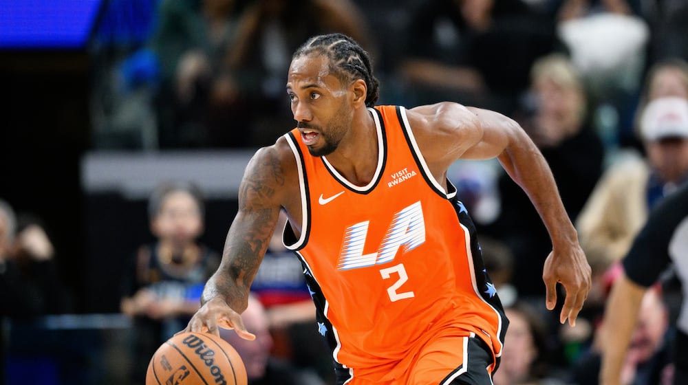 Los Angeles Clippers forward Kawhi Leonard controls the ball during the second half of an NBA basketball game against the Detroit Pistons, Sunday, Dec. 28, 2025, in Inglewood, Calif. (AP Photo/William Liang)
