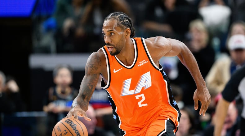 Los Angeles Clippers forward Kawhi Leonard controls the ball during the second half of an NBA basketball game against the Detroit Pistons, Sunday, Dec. 28, 2025, in Inglewood, Calif. (AP Photo/William Liang)
