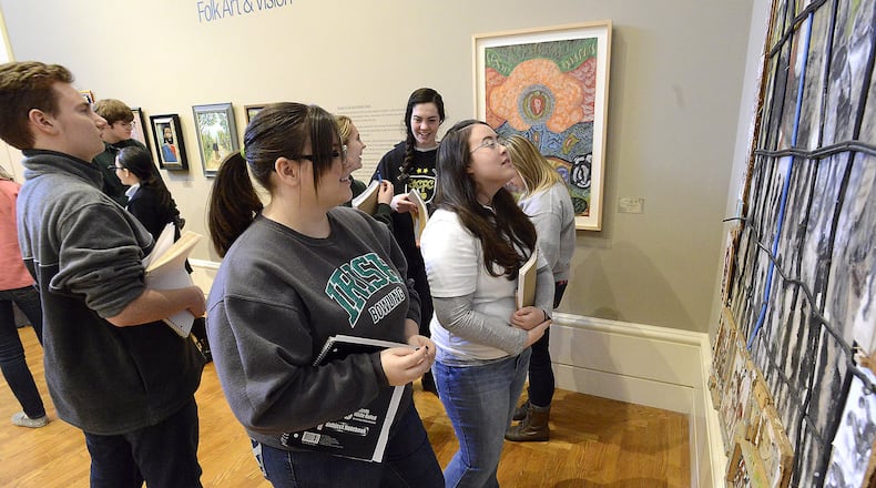 In 2015, Catholic Central art students looked over the Folk Art on display at the Springfield Museum during their weekly visit to the museum. The school participates in the national City Connects program. Bill Lackey/Staff