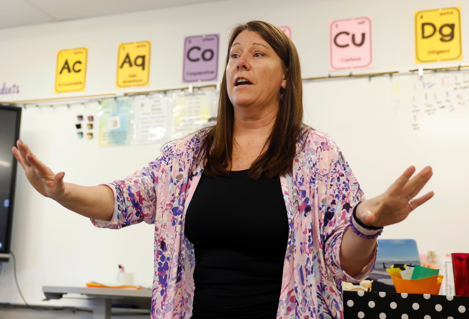 Eighth grade science teacher Tonya Collinsworth explains  a sedimentary rock activity to her students at Shawnee Middle School on Thursday, March 12, 2026, in Springfield. She's one of four teachers who will receive an Excellence in Teaching Award on March 23. JOSEPH COOKE/STAFF