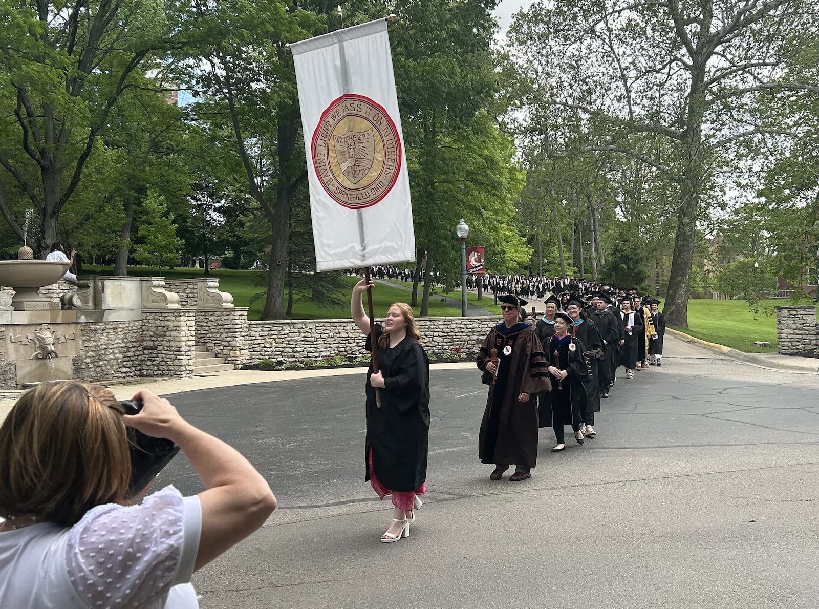 Wittenberg University conferred over 300 degrees at its graduation ceremony May 17, 2025, at the scenic commencement hollow on its Springfield campus. JEREMY P. KELLEY / STAFF