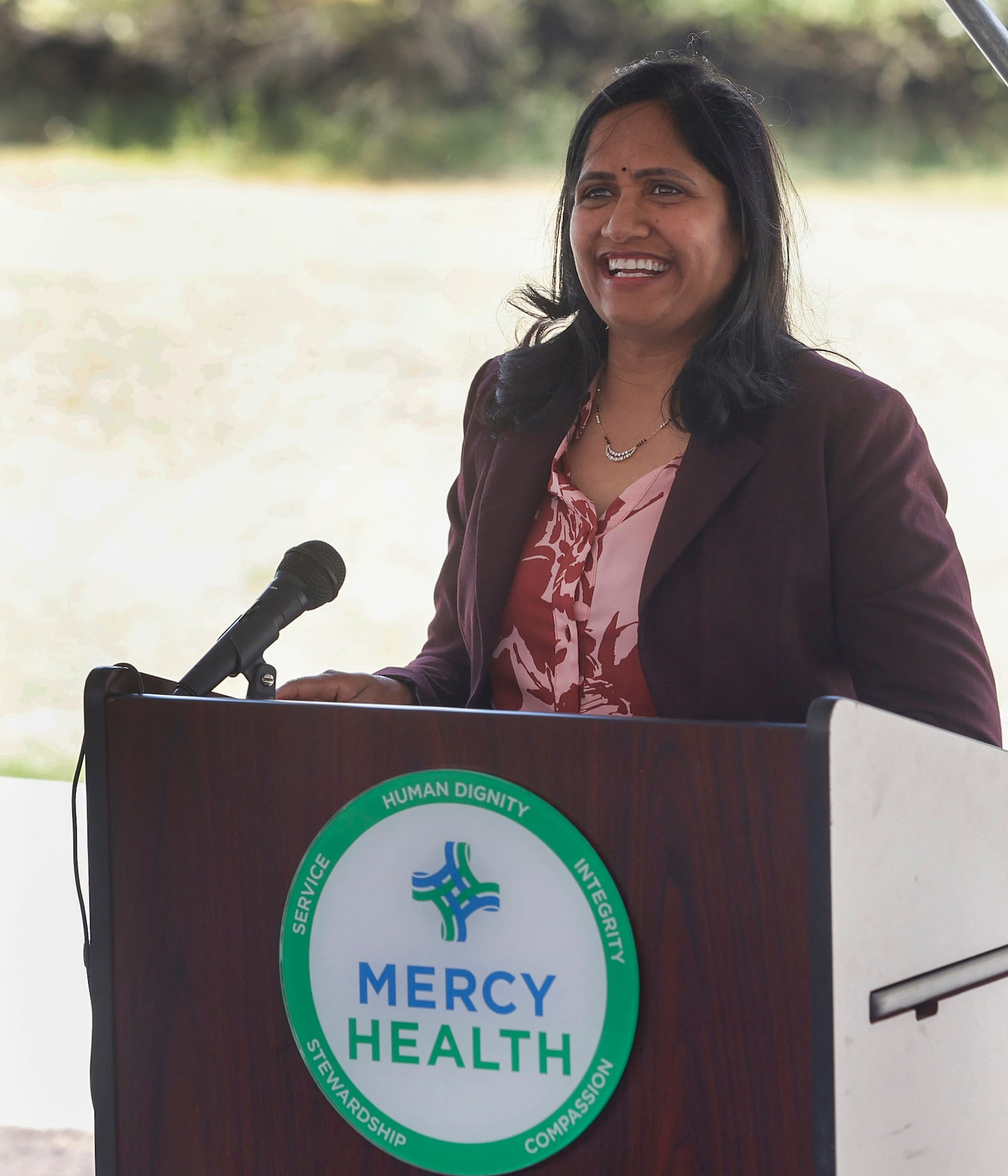Medical oncologist Jyothi Challa speaks before a ribbon cutting at a dedication and open house for the opening of the Mercy Health - Urbana Cancer Center on Thursday, September 4, 2025, in Urbana. JOSEPH COOKE/STAFF