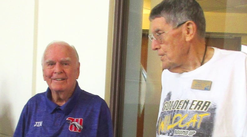 Jim Ingledue, left, is greeted by Committee Chairman Jim Rolfes during a recent Springfield Golden Era meeting.  It was a special surprise to have Jim Ingledue, the Founder of the Golden Era group, appeared at the get-together of Springfield High School graduates and friends at the Grace Evangelical Lutheran Church in Springfield on Monday, July 24. The Golden Era Wildcats was started by 1952 graduates organized by Ingledue in 2018 during their last class reunion. Graduates of the Springfield City School District are urged to participate in this fellowship and gathering of friends from all high school classes. The next get-together is scheduled for October 23 at Grace Lutheran. CONTRIBUTED