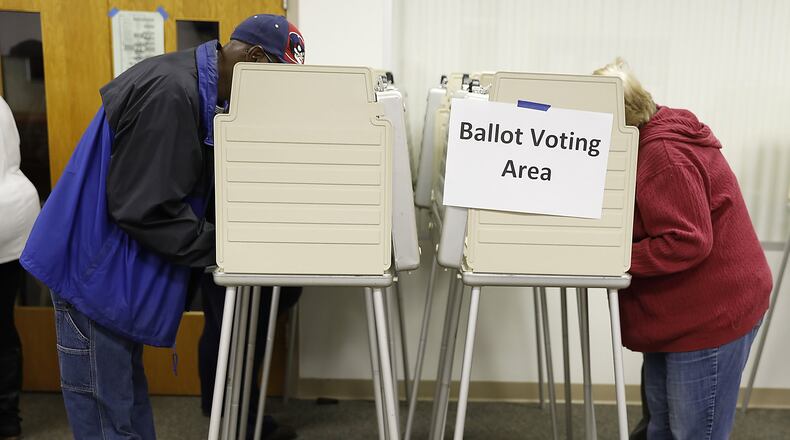 Students from Southeastern, Clark-Shawnee High School will help residents cast their ballots at the polls on Tuesday, Nov. 5. Bill Lackey/STAFF