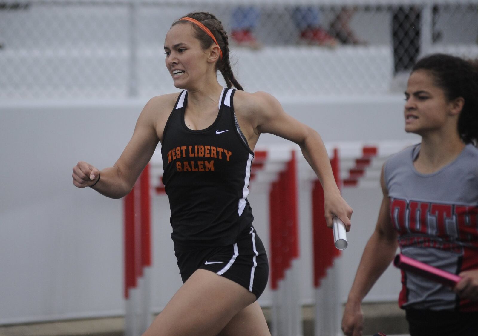West Liberty-Salem High School junior Janie Kopus anchored the 4x200-meter relay into the Division III regional track and field finals on Wednesday at Troy’s Memorial Stadium. The relay of Payton Umphries, Taylor Lauck, Lydia Moell and Kopus posted the sixth-best time (1:47.98) to qualify for Friday’s finals. MARC PENDLETON / STAFF