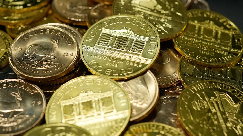 FILE - 1 Ounce Fine Gold Coins are displayed in the safe deposit boxes room at the Pro Aurum gold house in Munich, Germany, Friday, April 25, 2025. (AP Photo/Matthias Schrader, File)