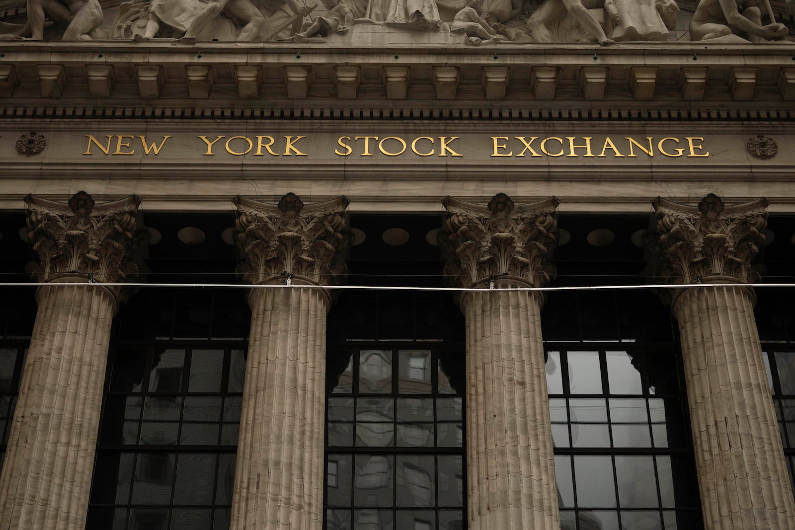 The facade of the New York Stock Exchange is seen, Wednesday, June 18, 2025, in New York. (AP Photo/Yuki Iwamura)