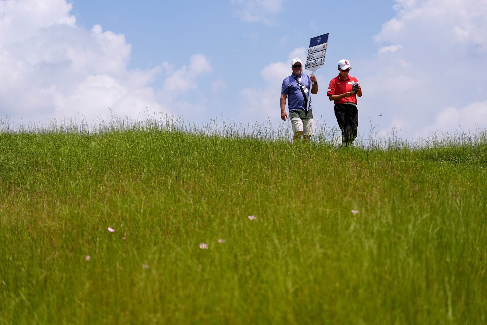 Hyo Joo Kim, of South Korea, walks on the ninth hole during the second round of the Chevron Championship LPGA golf tournament Friday, April 25, 2025, in The Woodlands, Texas. (AP Photo/Ashley Landis)