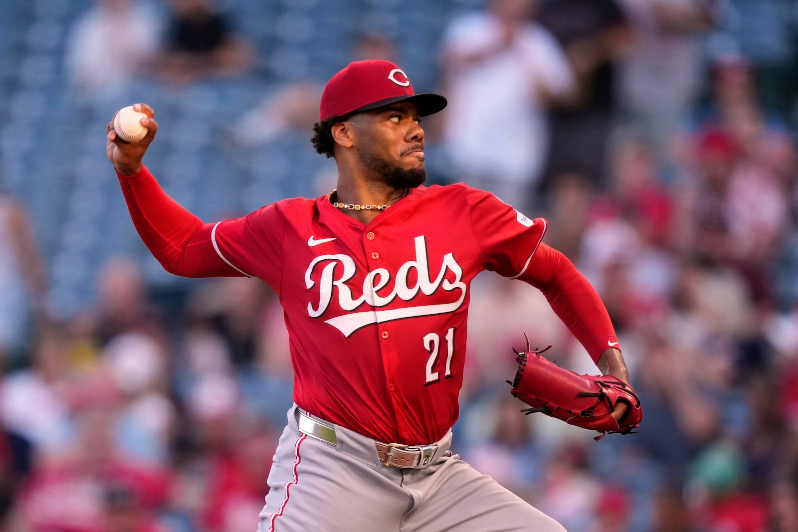 Cincinnati Reds starting pitcher Hunter Greene throws to the plate during the first inning of a baseball game against the Los Angeles Angels, Tuesday, Aug. 19, 2025, in Anaheim, Calif. (AP Photo/Mark J. Terrill)