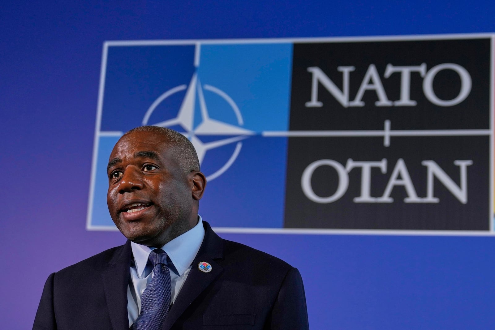 British Foreign Secretary David Lammy talks to journalists as he arrives for a NATO's informal meeting of foreign ministers in Antalya, southern Turkey, Thursday, May 15, 2025. (AP Photo/Khalil Hamra)