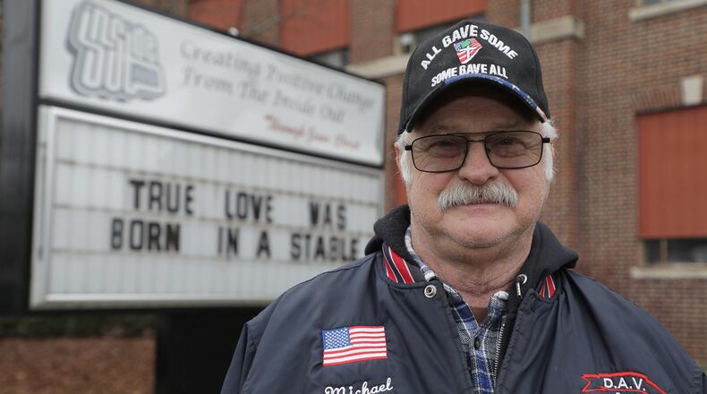 Michael Rogers volunteers at the Inside Out center and loves to help children. BILL LACKEY/STAFF