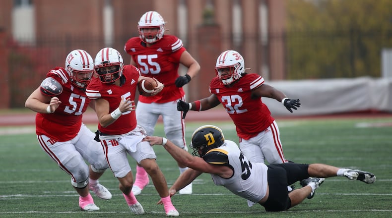 Wittenberg's Max Milton runs against DePauw on Saturday, Oct. 21, 2023, at Edwards-Maurer Field in Springfield. David Jablonski/Staff