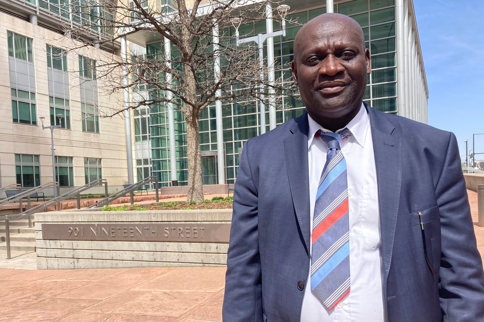 Demba Dem is photographed outside Denver federal court in Denver, Wednesday, April 9, 2025, after he testifying in the trial of Michael Sang Correa. (AP Photo/Colleen Slevin)