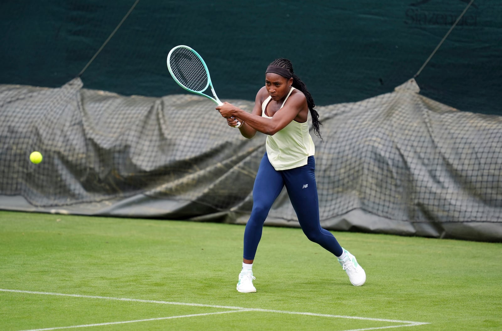Coco Gauff of the U.S. hits a backhand during a practice session at the All England Lawn Tennis and Croquet Club, ahead of the Wimbledon Championships, which begins on June 30th, in London, Monday June 23, 2025. (Adam Davy/PA via AP)