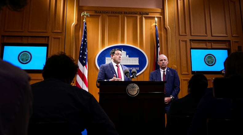 Senate President Rob McColley, left, and Speaker of the House Matt Huffman speak to the media after the State of the State address by Ohio Gov. Mike DeWine in the Ohio House chambers at the Ohio Statehouse on Wednesday, March 12, 2025, in Columbus, Ohio. (Samantha Madar/The Columbus Dispatch via AP, Pool)