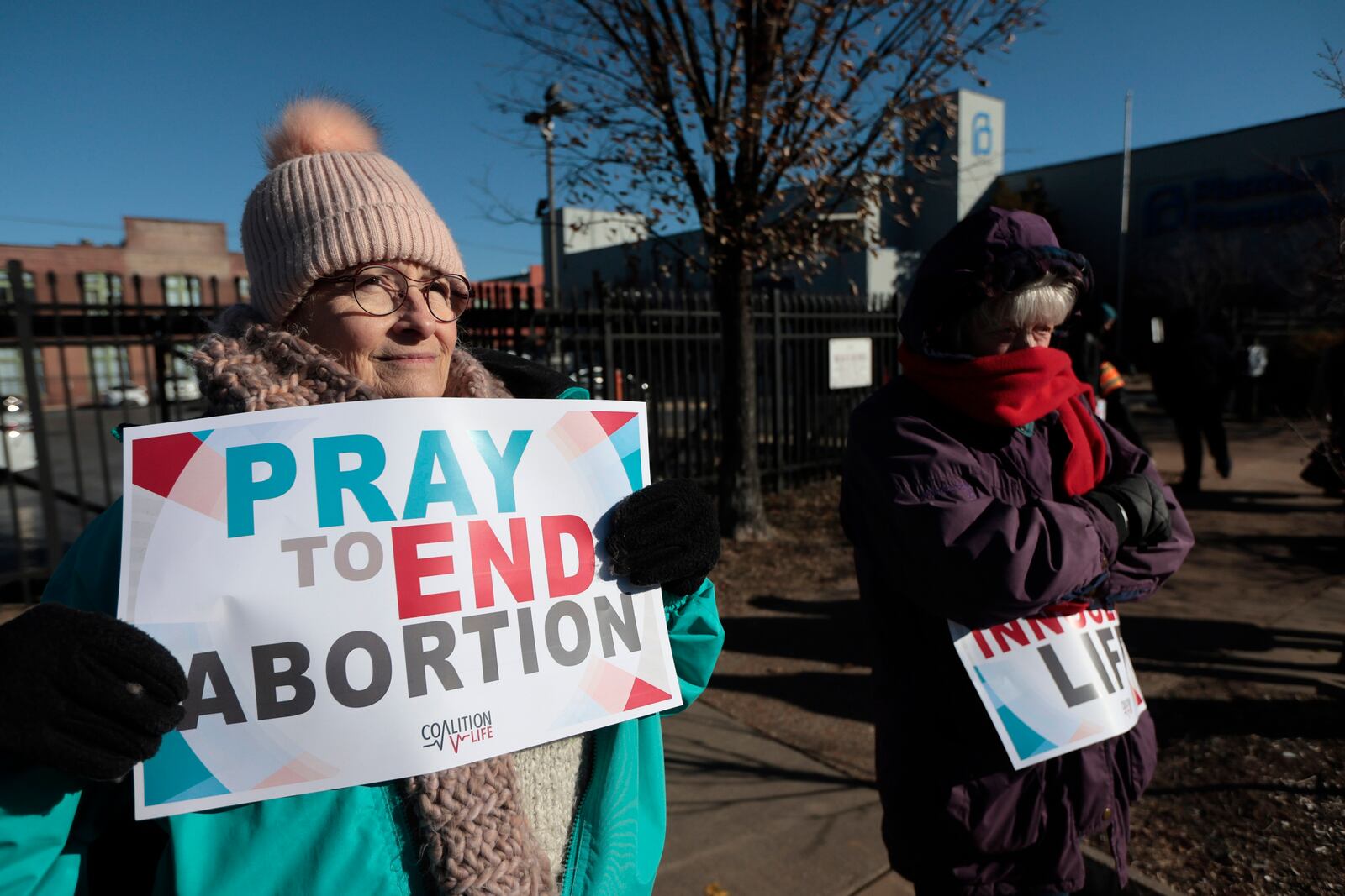 FILE - Anti-abortion protesters Jean Bullock, left, and Sue Dunn, demonstrate outside Planned Parenthood Great Rivers, Dec. 5, 2024, at in St. Louis, Mo. (Laurie Skrivan/St. Louis Post-Dispatch via AP, File)