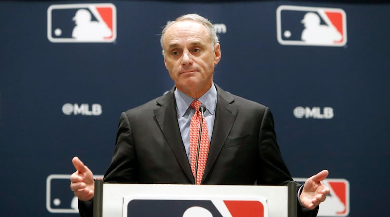FILE - In this Nov. 21, 2019, file photo, baseball commissioner Rob Manfred speaks to the media at the owners meeting in Arlington, Texas. The chance that there will be no Major League Baseball season increased substantially Monday, June 15, 2020, when the commissioner's office told the players' association it will not proceed with a schedule amid the coronavirus pandemic unless the union waives its right to claim management violated a March agreement between the feuding sides.
