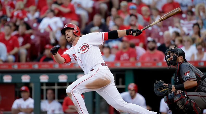 Reds shortstop Zack Cozart watches a home run leave Great American Ball Park against the Diamondbacks on July 19.