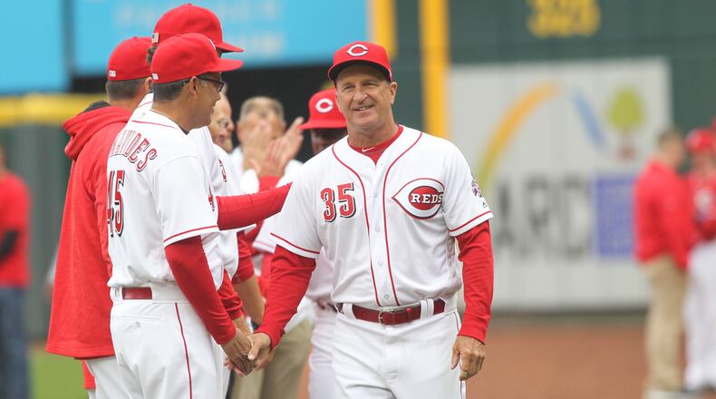 Reds bench coach Jim Riggleman is introduced on Opening Day on March 30, 2018, at Great American Ball Park in Cincinnati. David Jablonski/Staff
