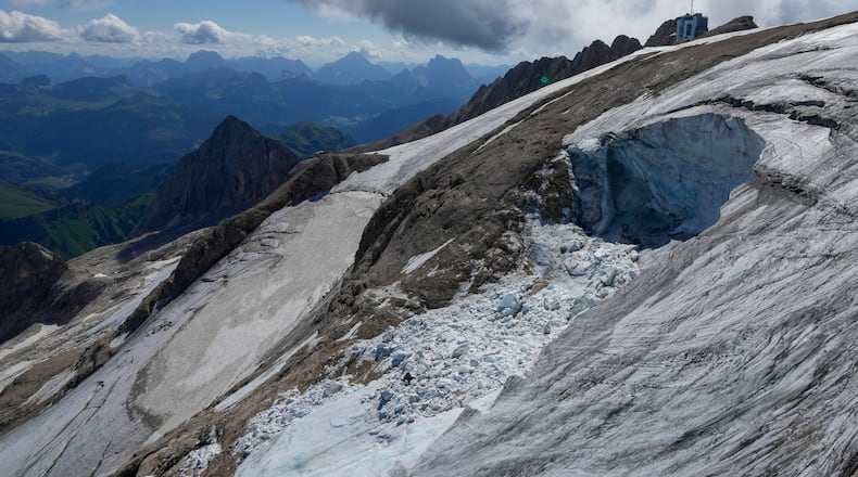 FILE - A view taken from a rescue helicopter of the Punta Rocca glacier near Canazei, in the Italian Alps in northern Italy, Tuesday, July 5, 2022. (AP Photo/Luca Bruno, File)