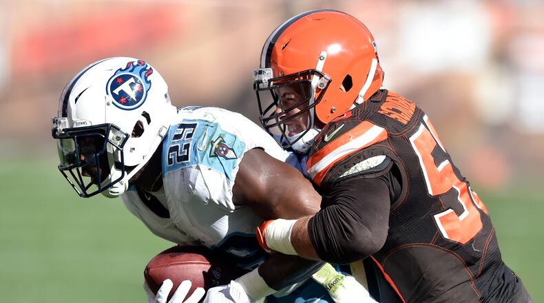 Cleveland Browns outside linebacker Joe Schobert (53) tackles Tennessee Titans running back DeMarco Murray (29) in the second half of an NFL football game, Sunday, Oct. 22, 2017, in Cleveland. (AP Photo/David Richard)