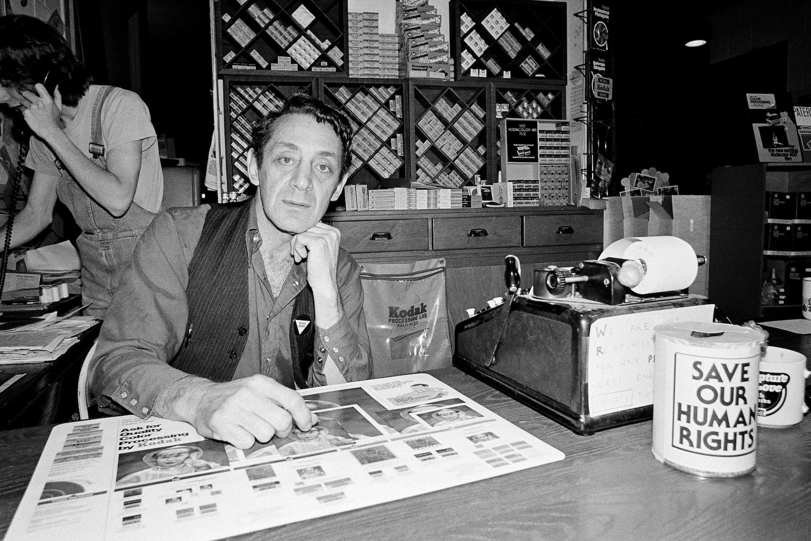 FILE - Harvey Milk, a gay political leader in San Francisco, is seen pictured in his camera store on Castro Street, June 28, 1977, in San Francisco. (AP Photo/File)